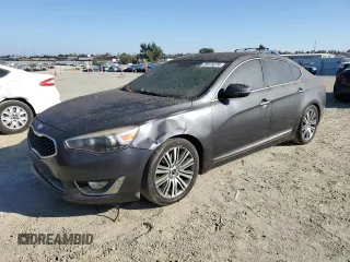 2014 Kia Cadenza Premium with VIN KNALN4D78E5128880, listed as a Copart auction lot 76414274 with 182,942 mi miles and Salvage Title. Bid and sale history available at carsss.com. Image 1.
