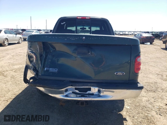 2001 Ford F-150 XLT with VIN 1FTRW07L21KF52515, listed as a Copart auction lot 48303905 with 236,567 mi miles and Salvage title. Bid and sale history available at DreamBid. Image 6.