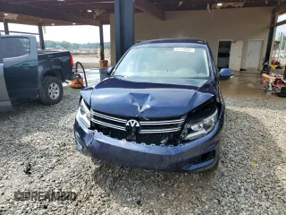 2013 Volkswagen Tiguan S with VIN WVGAV3AX6DW621714, listed as a Copart auction lot 54730565 with 121,257 mi miles and Salvage title. Bid and sale history available at DreamBid. Image 5.