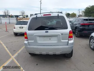 2005 Ford Escape Hybrid with VIN 1FMCU95H05KC95225, listed as a IAAI auction lot 41798610 with 216,659 mi miles. Bid and sale history available at carsss.com. Image 16.