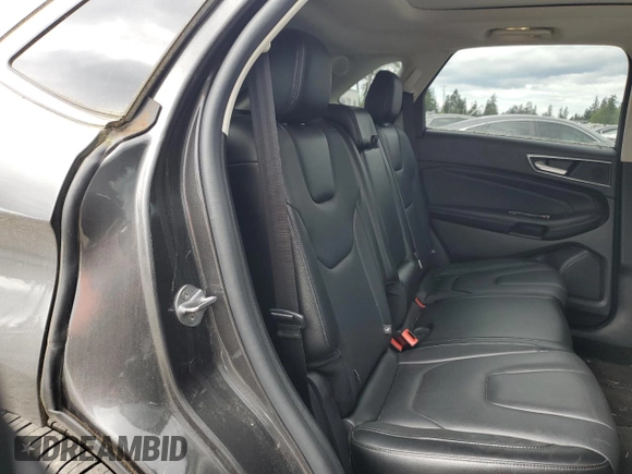 2015 Ford Edge Titanium z VIN 2FMTK4K84FBB09582, wystawiony jako Copart lot #55801915 z przebiegiem 72 533 mil mil oraz Szkoda całkowita • Salvage title. Historia ofert i sprzedaży dostępna na DreamBid. Obrazek 11.
