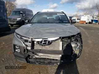 2023 Hyundai Santa Cruz SEL z VIN 5NTJCDAE4PH065039, wystawiony jako Copart lot #58940925 z przebiegiem 18 129 mil mil oraz Szkody całkowita. Historia ofert i sprzedaży dostępna na DreamBid. Obrazek 5.
