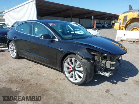 2019 Tesla Model 3 Long Range with VIN 5YJ3E1EB9KF231742, listed as a IAAI auction lot 42114608 with 86,657 mi miles and . Bid and sale history available at DreamBid. Image 1.