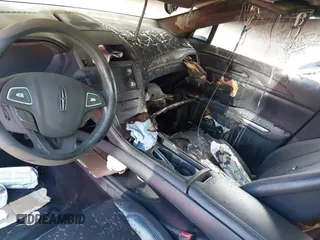 2015 Lincoln MKZ с VIN 3LN6L2JK3FR616535, выставлен на аукционе IAAI как лот 41898478 с пробегом Не указан миль и . История ставок и продаж доступна на DreamBid. Изображение 6.