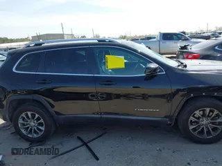 2019 Jeep Cherokee Latitude Plus with VIN 1C4PJLLB0KD358852, listed as a IAAI auction lot 41794999 with 112,667 mi miles. Bid and sale history available at carsss.com. Image 14.