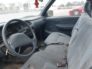 1993 Toyota T100 DX z VIN JT4VD10AXP0011610, wystawiony jako IAAI lot #42393197 z przebiegiem 238 031 mil mil oraz . Historia ofert i sprzedaży dostępna na DreamBid. Obrazek 8.