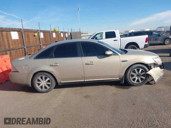 2008 Ford Taurus SEL with VIN 1FAHP24W38G111319, listed as a IAAI auction lot 41585092 with 216,419 mi miles. Bid and sale history available at carsss.com. Image 13.
