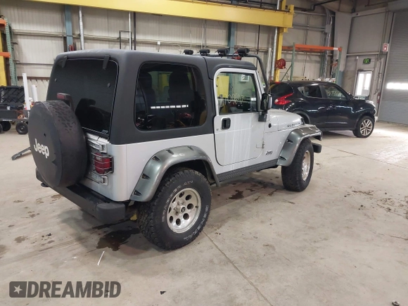2003 Jeep Wrangler Rubicon with VIN 1J4FA69S13P375142, listed as a IAAI auction lot 41709647 with 125,443 mi miles and . Bid and sale history available at DreamBid. Image 4.