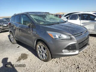 2014 Ford Escape Titanium with VIN 1FMCU9J90EUD94405, listed as a Copart auction lot 68489754 with 52,045 mi miles and Salvage Title. Bid and sale history available at DreamBid. Image 4.