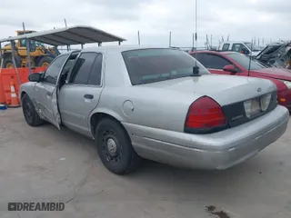 2005 Ford Police Interceptor with VIN 2FAFP71W65X163932, listed as a IAAI auction lot 41531164 with 268,769 mi miles. Bid and sale history available at carsss.com. Image 3.