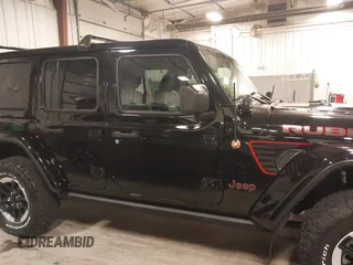 2021 Jeep Wrangler Unlimited Rubicon with VIN 1C4HJXFN2MW719135, listed as a IAAI auction lot 41835698 with 20,447 mi miles and . Bid and sale history available at DreamBid. Image 13.
