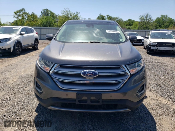 2015 Ford Edge Titanium z VIN 2FMPK4K8XFBB98334, wystawiony jako Copart lot #56953495 z przebiegiem 110 129 mil mil oraz Szkody całkowita. Historia ofert i sprzedaży dostępna na DreamBid. Obrazek 5.