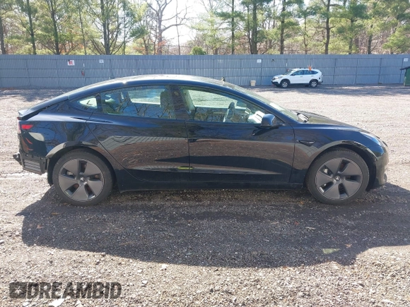 2023 Tesla Model 3 Long Range with VIN 5YJ3E1EB1PF392027, listed as a IAAI auction lot 41983638 with 31,415 mi miles and . Bid and sale history available at DreamBid. Image 12.