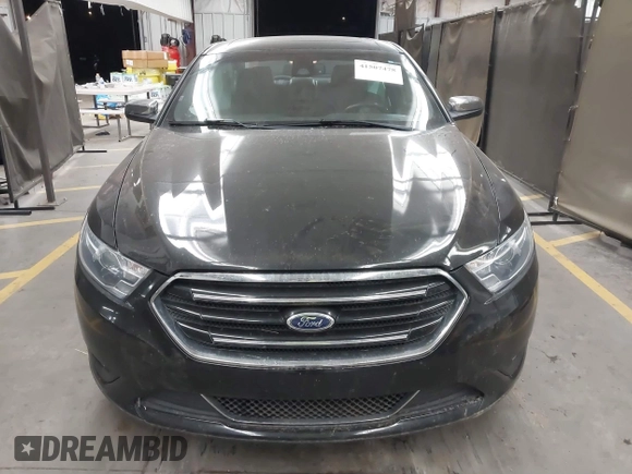 2015 Ford Taurus Limited with VIN 1FAHP2J83FG152343, listed as a IAAI auction lot 41507478 with 97,648 mi miles. Bid and sale history available at carsss.com. Image 12.