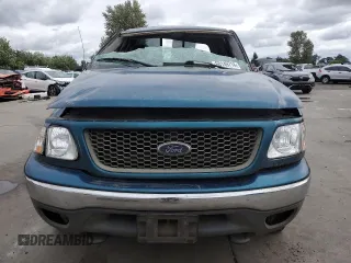2001 Ford F-150 XL z VIN 1FTRX18W61NA24177, wystawiony jako Copart lot #60149714 z przebiegiem 192 297 mil mil oraz Szkoda całkowita • Salvage title. Historia ofert i sprzedaży dostępna na DreamBid. Obrazek 5.