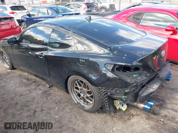 2013 Hyundai Genesis Coupe 2.0T z VIN KMHHT6KD2DU097886, wystawiony jako IAAI lot #41864894 z przebiegiem 152 642 mil mil oraz . Historia ofert i sprzedaży dostępna na DreamBid. Obrazek 3.