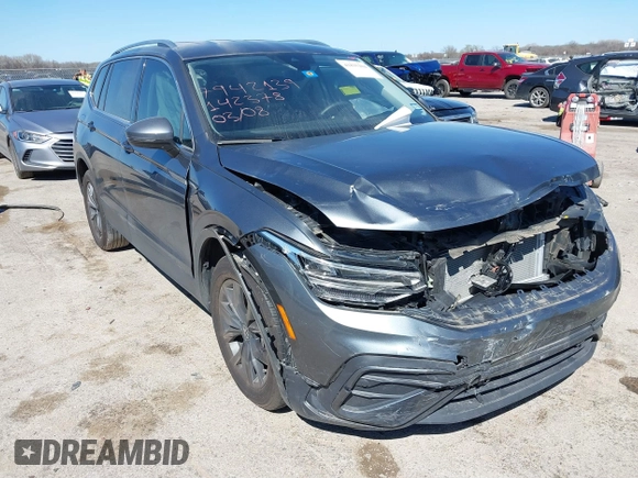 2023 Volkswagen Tiguan SE with VIN 3VV3B7AX5PM142378, listed as a IAAI auction lot 41835204 with 13,670 mi miles and . Bid and sale history available at DreamBid. Image 1.
