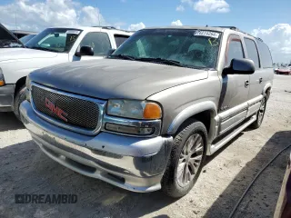 2002 GMC Yukon XL SLT with VIN 1GKEC16Z82J255909, listed as a Copart auction lot 76274264 with 265,382 mi miles and Non Repairable. Bid and sale history available at carsss.com. Image 1.
