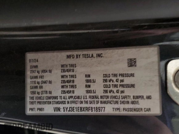 2024 Tesla Model 3 Long Range with VIN 5YJ3E1EBXRF818977, listed as a Copart auction lot 47303885 with 14,189 mi miles and Salvage Title. Bid and sale history available at DreamBid. Image 14.