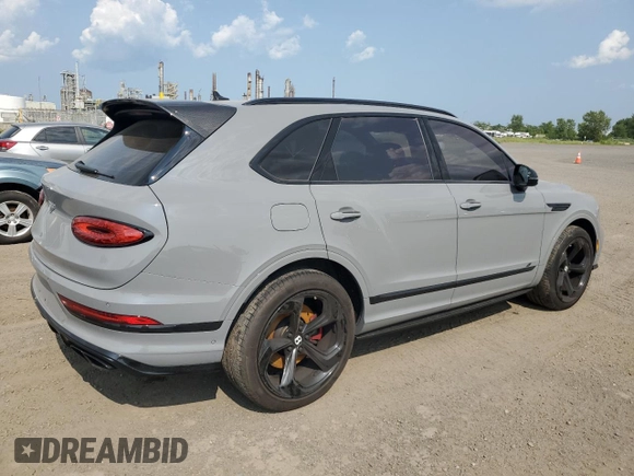 2022 Bentley Bentayga V8 z VIN SJAAM2ZVXNC013736, wystawiony jako Copart lot #67453664 z przebiegiem 22 660 mil mil oraz Nie do naprawy. Historia ofert i sprzedaży dostępna na DreamBid. Obrazek 3.