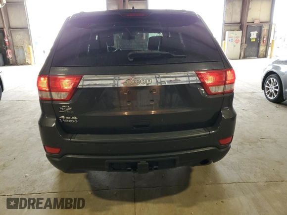 2011 Jeep Grand Cherokee Laredo with VIN 1J4RR4GG6BC657808, listed as a Copart auction lot 55255685 with 86,941 mi miles and Salvage title. Bid and sale history available at DreamBid. Image 6.