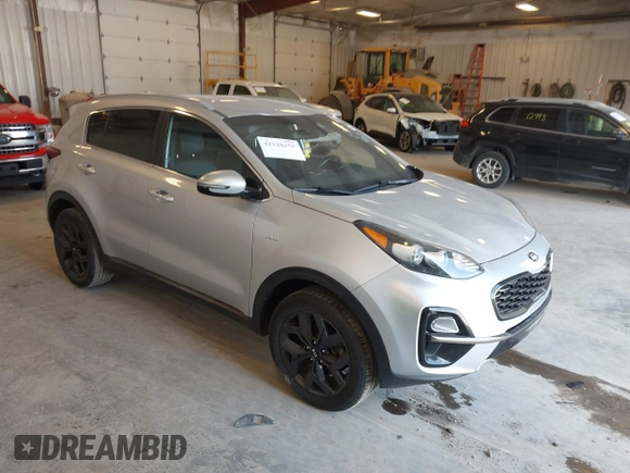 2020 Kia Sportage S with VIN KNDP6CAC3L7813464, listed as a IAAI auction lot 42128252 with 76,271 mi miles. Bid and sale history available at carsss.com. Image 1.
