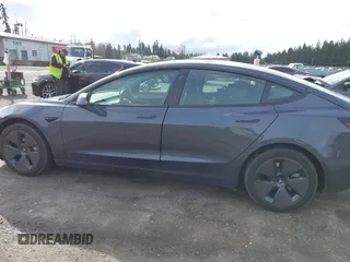 2023 Tesla Model 3 with VIN 5YJ3E1EA2PF623217, listed as a IAAI auction lot 41701413 with 21,246 mi miles and . Bid and sale history available at DreamBid. Image 15.