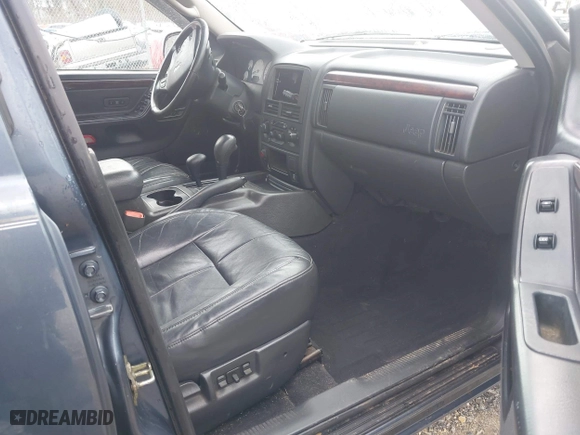 2003 Jeep Grand Cherokee Limited with VIN 1J4GW58N43C521617, listed as a IAAI auction lot 41781064 with 228,086 mi miles. Bid and sale history available at carsss.com. Image 5.