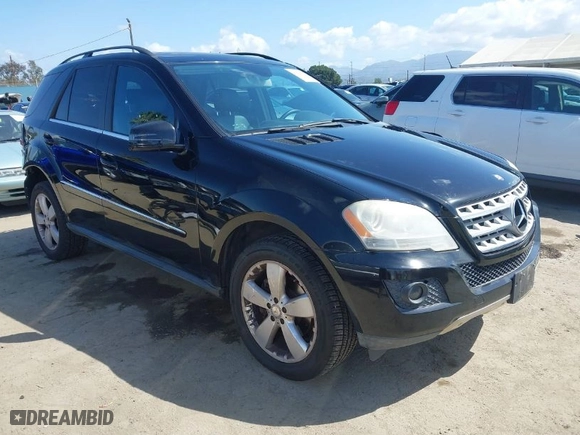 2011 Mercedes-Benz M-Class ML 350 with VIN 4JGBB5GB4BA732065, listed as a IAAI auction lot 41939779 with 138,533 mi miles. Bid and sale history available at carsss.com. Image 1.