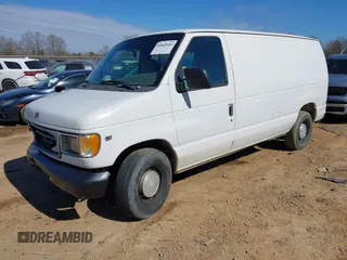 1999 Ford Econoline Cargo with VIN 1FTRE14W0XHB64440, listed as a IAAI auction lot 41645551 with 239,114 mi miles. Bid and sale history available at carsss.com. Image 17.