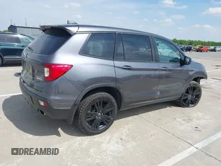 2019 Honda Passport Sport with VIN 5FNYF8H27KB002001, listed as a IAAI auction lot 42299635 with 54,542 mi miles and . Bid and sale history available at DreamBid. Image 4.