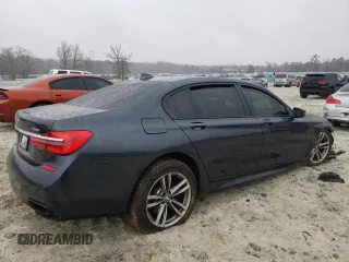 2016 BMW 7 Series 750i xDrive with VIN WBA7F2C54GG415272, listed as a Copart auction lot 86573664 with Not provided miles and Salvage title. Bid and sale history available at DreamBid. Image 3.