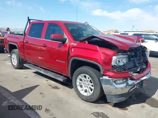 2018 GMC Sierra 1500 SLE z VIN 3GTU2MEC3JG592268, wystawiony jako IAAI lot #42158058 z przebiegiem 139 473 mil mil oraz . Historia ofert i sprzedaży dostępna na DreamBid. Obrazek 1.