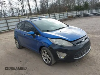 2011 Ford Fiesta SES with VIN 3FADP4FJ0BM113781, listed as a IAAI auction lot 41733662 with 191,092 mi miles. Bid and sale history available at carsss.com. Image 1.