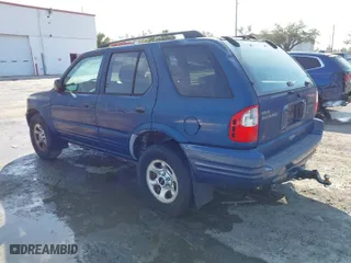 2004 Isuzu Rodeo S with VIN 4S2CK58W944317209, listed as a IAAI auction lot 41498160 with 114,764 mi miles. Bid and sale history available at carsss.com. Image 3.