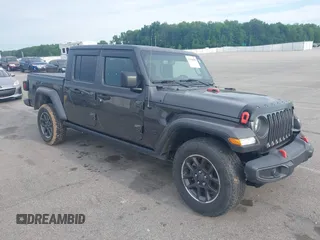 2021 Jeep Gladiator Willys z VIN 1C6HJTAG5ML513978, wystawiony jako IAAI lot #42298998 z przebiegiem 33 497 mil mil oraz . Historia ofert i sprzedaży dostępna na DreamBid. Obrazek 1.
