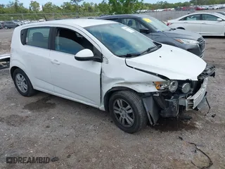 2014 Chevrolet Sonic LT with VIN 1G1JC6SH6E4192423, listed as a IAAI auction lot 41925810 with 148,564 mi miles. Bid and sale history available at carsss.com. Image 1.
