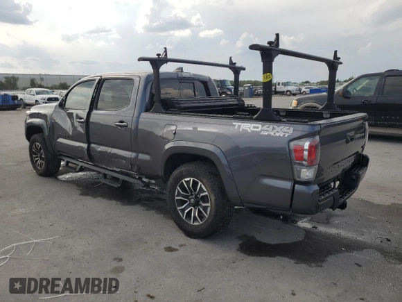 2020 Toyota Tacoma SR5 z VIN 3TYDZ5BN9LT000209, wystawiony jako Copart lot #56127875 z przebiegiem 92 350 mil mil oraz Szkoda całkowita • Salvage title. Historia ofert i sprzedaży dostępna na DreamBid. Obrazek 2.