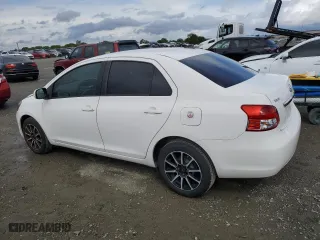 2010 Toyota Yaris with VIN JTDBT4K3XA1360659, listed as a Copart auction lot 51490475 with 210,967 mi miles and Salvage Title. Bid and sale history available at carsss.com. Image 2.