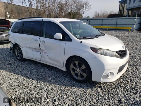 2014 Toyota Sienna SE with VIN 5TDXK3DCXES498422, listed as a Copart auction lot 51060775 with 131,541 mi miles and Clean Title. Bid and sale history available at DreamBid. Image 4.