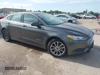 2017 Ford Fusion Hybrid SE with VIN 3FA6P0LU5HR336779, listed as a IAAI auction lot 42691789 with 140,720 mi miles and . Bid and sale history available at DreamBid. Image 1.