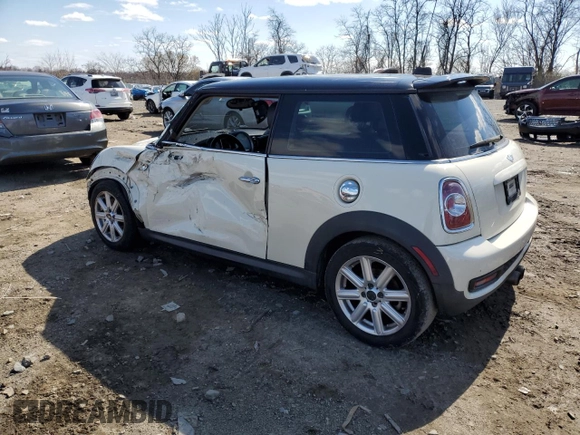 2011 MINI Hardtop S with VIN WMWSV3C59BTY23205, listed as a Copart auction lot 48672675 with 120,457 mi miles and Salvage Title. Bid and sale history available at DreamBid. Image 2.