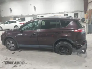 2018 Toyota RAV4 LE with VIN 2T3BFREV0JW759714, listed as a IAAI auction lot 41823084 with 119,909 mi miles and . Bid and sale history available at DreamBid. Image 14.