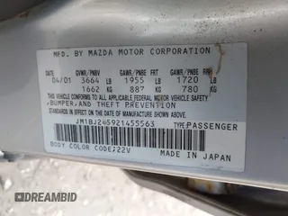 2002 Mazda Protege with VIN JM1BJ245921455563, listed as a IAAI auction lot 42064853 with Not Provided miles and . Bid and sale history available at DreamBid. Image 9.