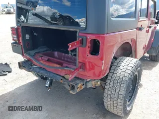 2012 Jeep Wrangler Unlimited Sport z VIN 1C4BJWDG8CL258625, wystawiony jako IAAI lot #42266102 z przebiegiem 58 594 mil mil oraz . Historia ofert i sprzedaży dostępna na DreamBid. Obrazek 6.