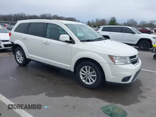 2013 Dodge Journey SXT with VIN 3C4PDCBG9DT564303, listed as a IAAI auction lot 41954764 with 132,125 mi miles. Bid and sale history available at carsss.com. Image 1.