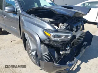 2023 Toyota Tacoma 4WD SR with VIN 3TMCZ5AN1PM600236, listed as a IAAI auction lot 41603152 with 35,956 mi miles. Bid and sale history available at carsss.com. Image 18.