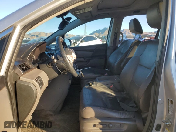 2015 Honda Odyssey EX-L with VIN 5FNRL5H69FB077433, listed as a Copart auction lot 88999285 with 193,926 mi miles and Salvage Title. Bid and sale history available at DreamBid. Image 7.
