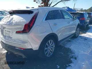 2022 Cadillac XT4 AWD Premium Luxury with VIN 1GYFZDR4XNF139337, listed as a IAAI auction lot 41326816 with 26,823 mi miles and . Bid and sale history available at carsss.com. Image 4.