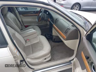 2001 Lincoln Continental with VIN 1LNHM97V51Y602324, listed as a IAAI auction lot 42053789 with 192,221 mi miles. Bid and sale history available at carsss.com. Image 5.